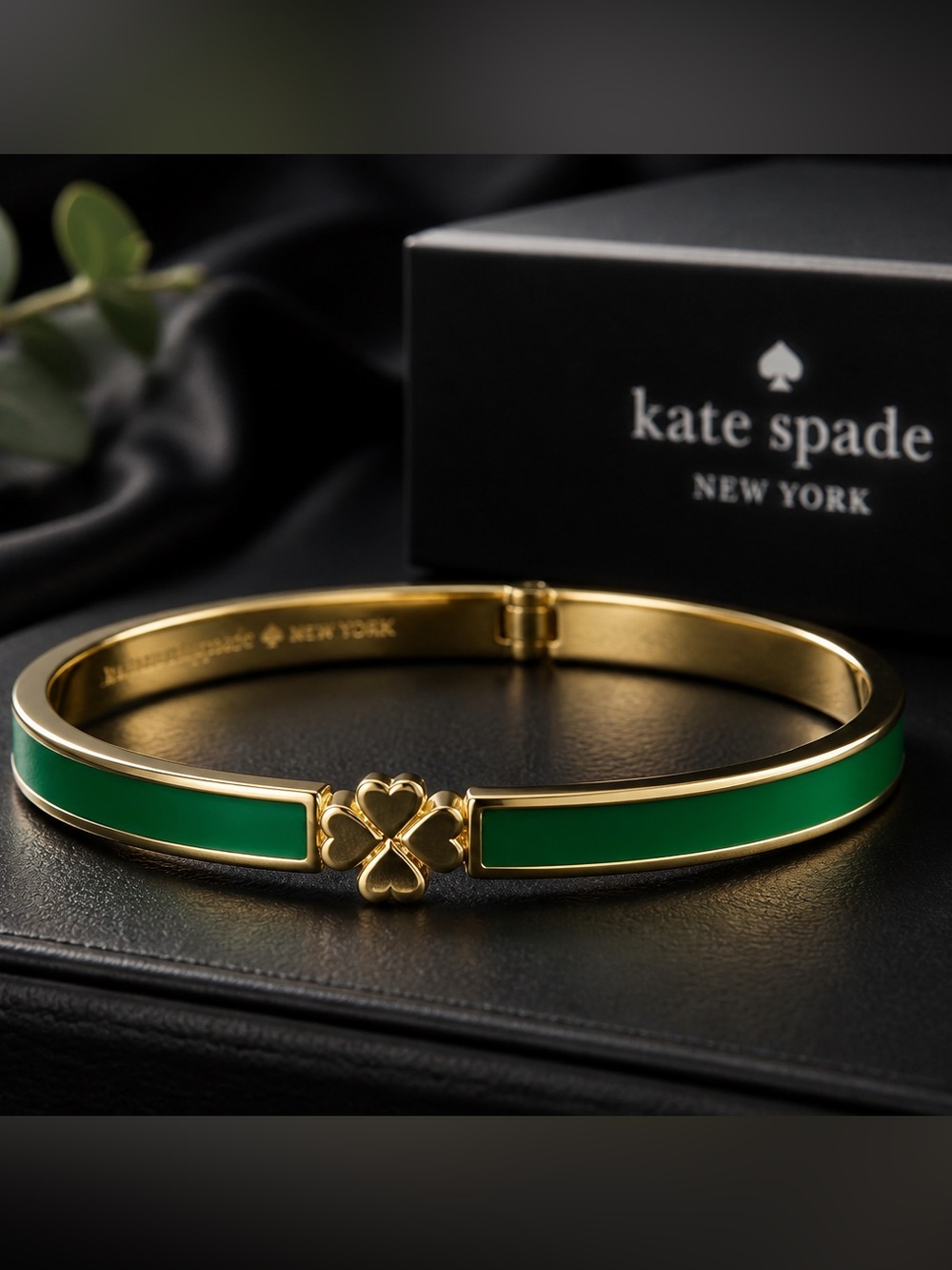 kate spade gold-tone bangle with green enamel clover